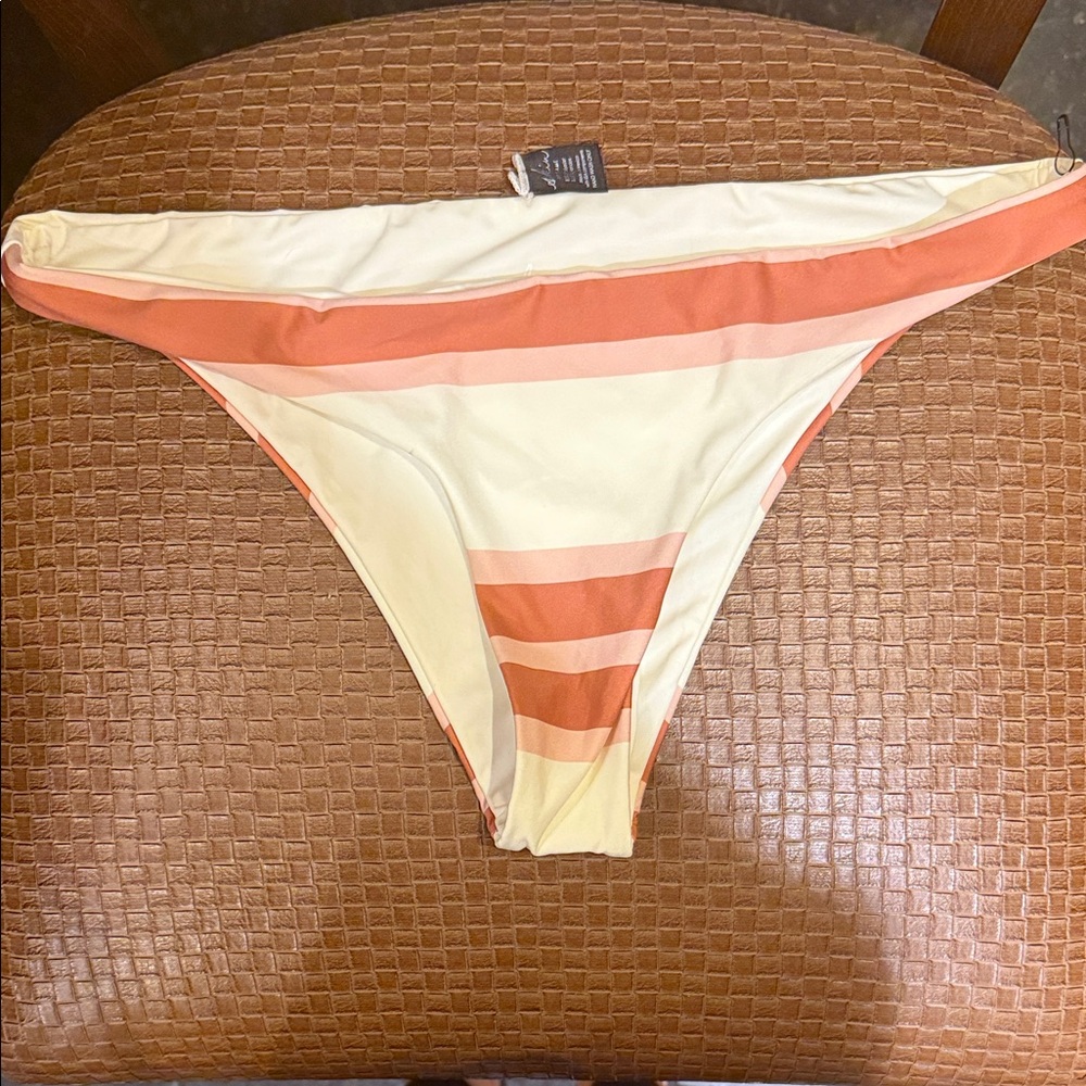 NWOT Skin Cream and Orange Bikini Bottom